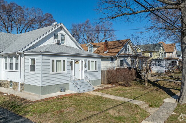 Tree-lined streets in East Lansdowne cool off homes and visitors in the summer.