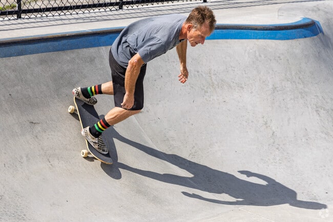 A skateboarder rides the bowl at a local skate park near Arcadian Shores.