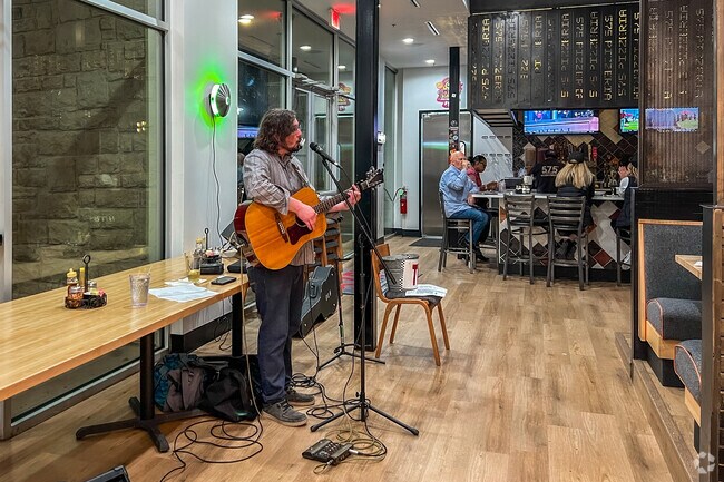 Feel the great atmosphere and the friendly service at 575 Pizzeria near Lakewood Village.