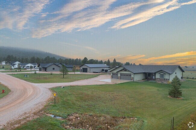 Ranch-style homes in Summerset line gently curving roads and green lots.