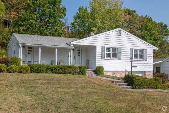 Many homes in the Wehnwood neighborhood are ranches with well-kept lawns.