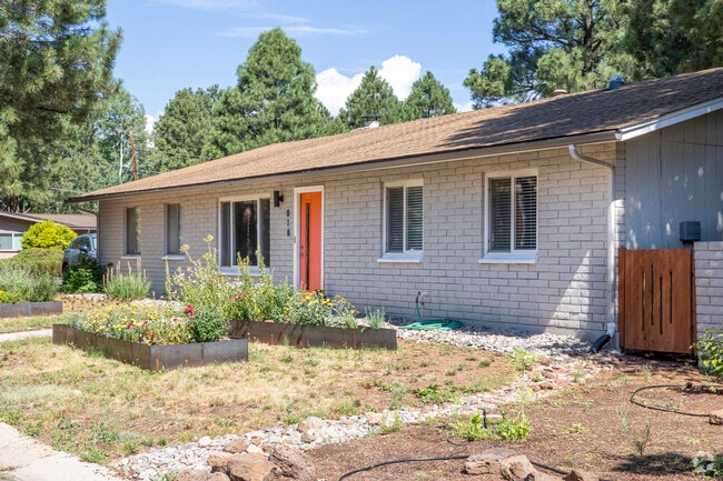Mid century style and front yard gardens add charm to the Cherry Hill neighborhood.