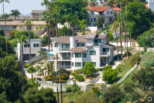 Pomona Valley’s hills hide Spanish-style homes with tile roofs and arched entries.