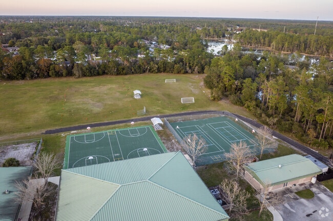 Heritage Middle School features outdoor basketball and tennis courts, as well as a soccer field.