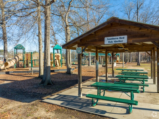 Playground at Seven oaks park with pavilion.