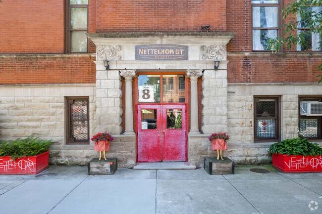 Potted plants and entrance to Nettelhorst Elementary School.