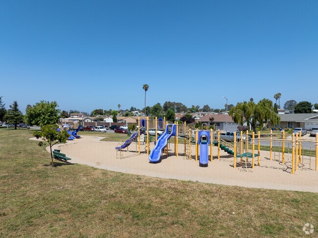 Families in Bolsa Knolls enjoy Santa Rita Park's engaging play structures.