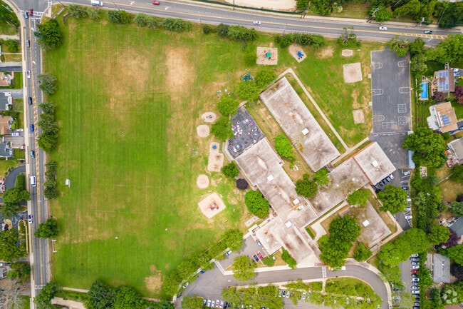 This birds eye view of Pulaski Road School in East Northport shows its playgrounds and field.