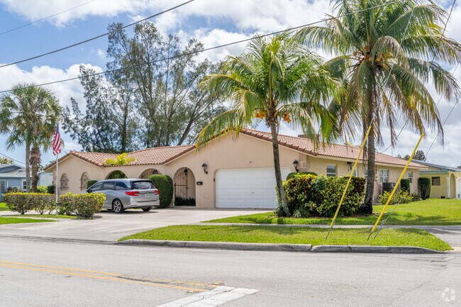 Mediterranean-style homes with tile roofs add character to Margate Gardens’ residential streets.