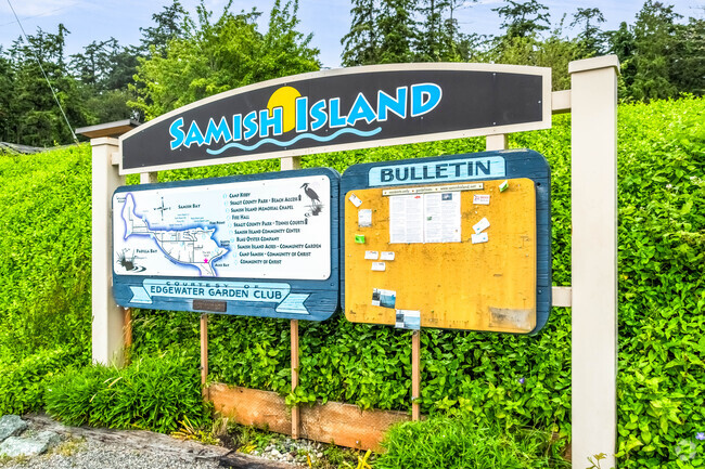 Samish Island welcome sign at the entrance to the neighborhood with great info for your visit.