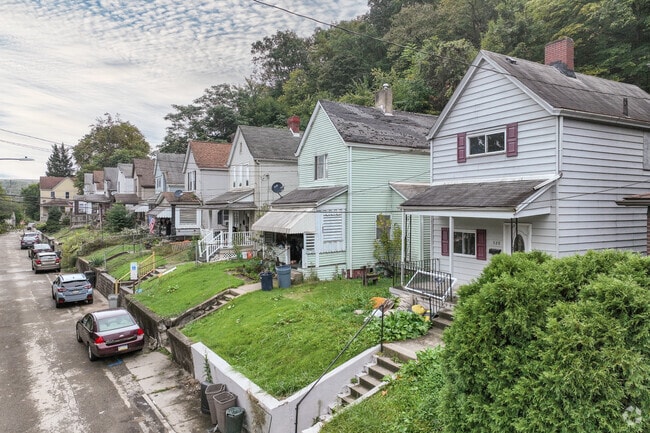 Some houses in Wilmerding are situated up on a hill.