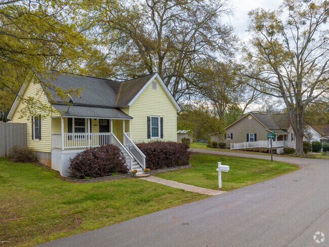 Tree lines streets and homes are featured in Pendleton, SC.