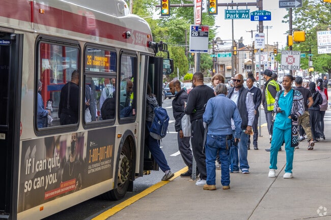 Many of the Logan locals catch the train or bus to work.