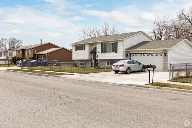Beautiful home enclosed by fencing.
