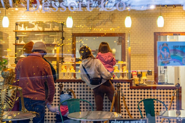Families pick up freshly baked sweets at The Hungry Hero Dessert Co. in Sherwood, OR.