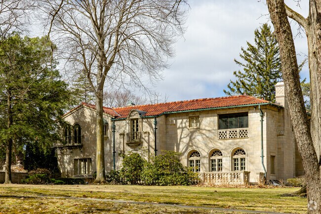 Grand Mediterranean estates border the edge of Swartz Creek golf course in Woodcroft Estates.