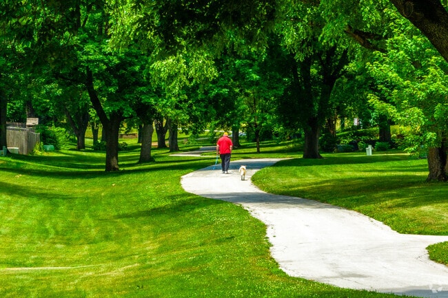 Residents can take a stroll thru Knolls Park in West Des Moines.