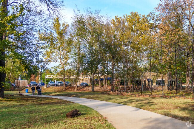 Walk the long paved path around Creekmore Park.