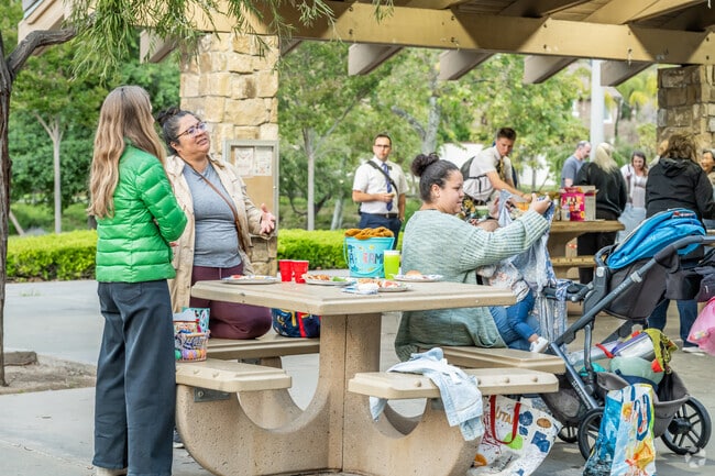 Tustin Ranch’s Red Hill Ward Easter Party serves pizza, fried chicken, and tasty snacks.