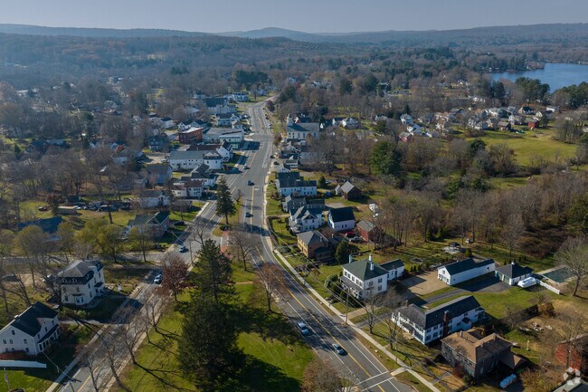 An aerial photograph shows the homes in downtown of West Brookfield