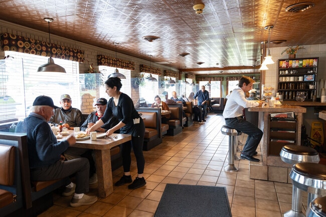 Stop by Mike's Diner for a local treat and chat with a neighbor.