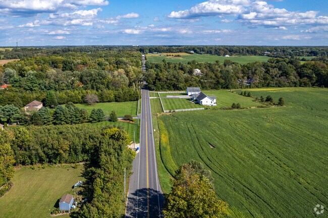 Travel the long rural roads through farmland in Harrison Township.