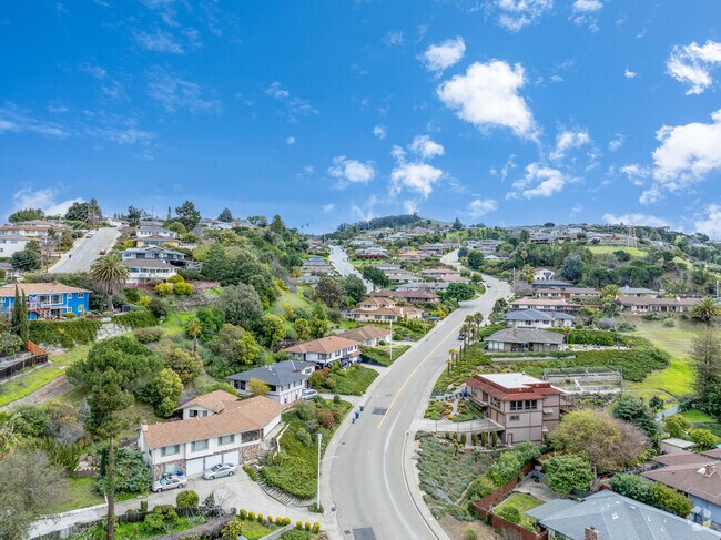 The homes in Bay-O-Vista were built in the 1960s on curving streets and steep slopes.