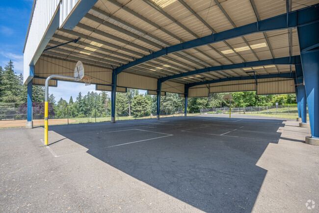 Covered basketball courts provide shade on sunny days at Cedar Mill Elementary in Portland.