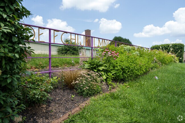 Fun landscaping and sculptural elements adorn Primos Elementary School's campus.