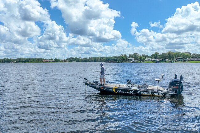 Residents of Lake Magdalene go fishing for fun during the day.