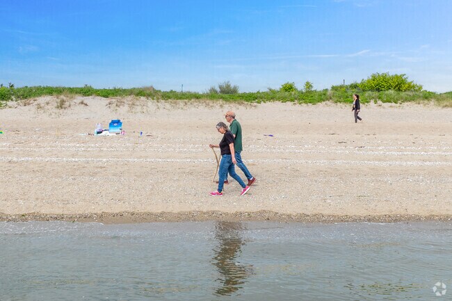 Take a stroll along Hammonasset beach on a beautiful day in Madison.