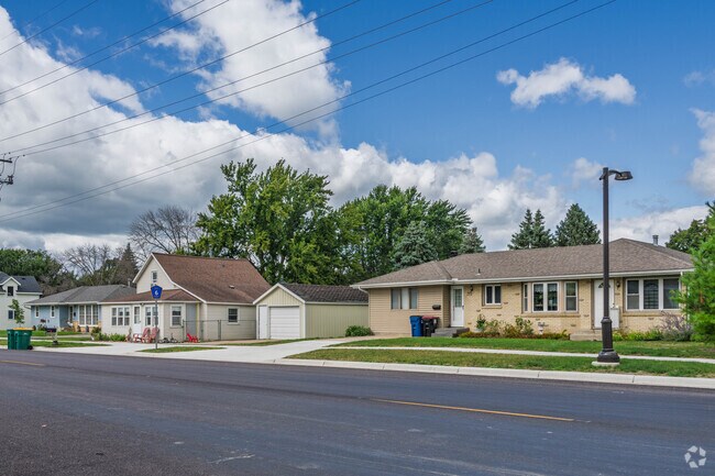 Belle Plaine housing spans different eras from century-old two-story homes near downtown priced $110,000-$320,000 to higher-end newer properties in southern areas near the high school.