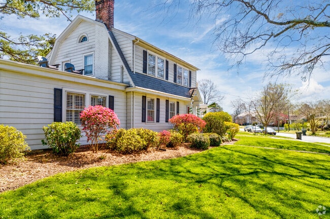 Colonial-style homes with manicured hedges stand proudly in Lafayette-Winona.