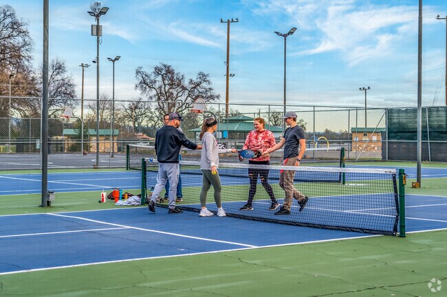 Anderson River Park features tennis and pickleball courts.