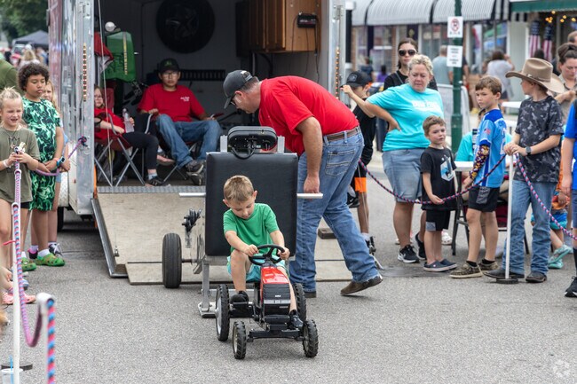 Kids can have a go at the pedal tractor pull and win a trophy at Farmington Dew Days.
