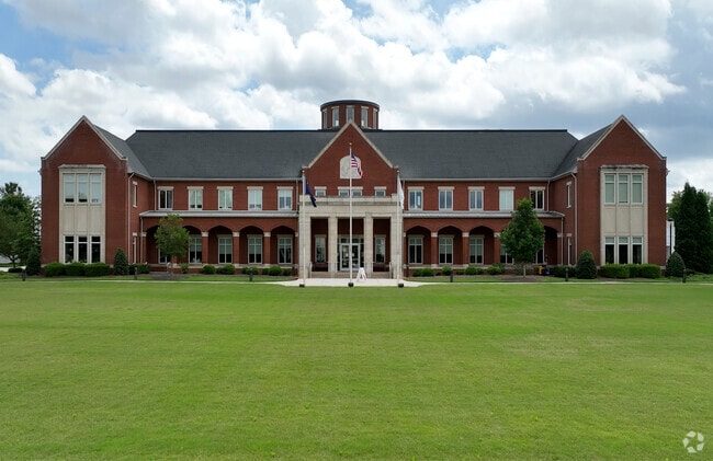 Spartanburg Day School students and staff are welcomed through the Grand Hall doors.