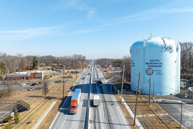 Kendall Park is situated alongside Route 1, which is a major road in the area.