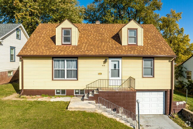 The hills of Clifton Hills offer tucked garages for some homes.