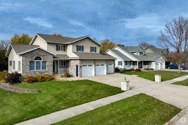 New Hampton neighborhoods often feature sidewalks for getting out and visiting neighbors.
