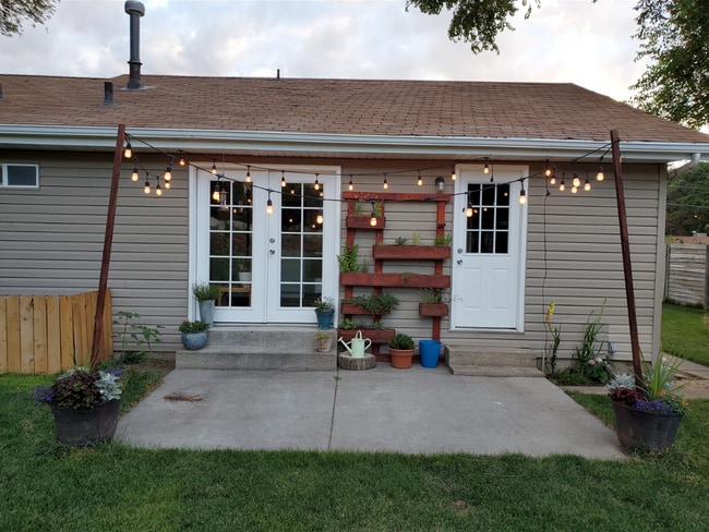 Back porch with built in flower/herb garden