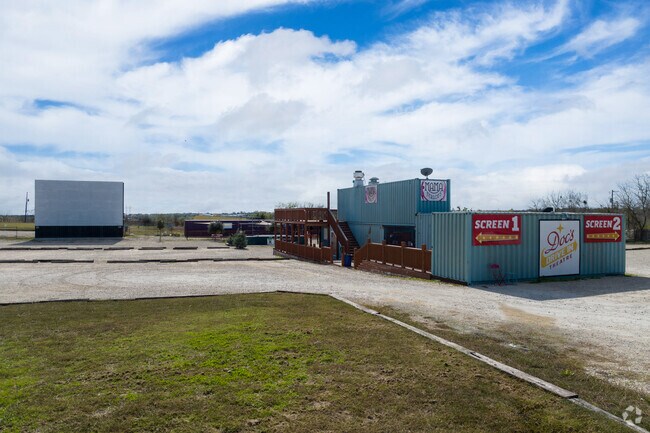 Doc's Drive In Theatre near Mustang Ridge offers a unique outdoor movie experience.