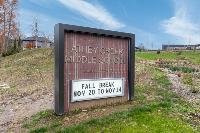 A sign welcomes visitors and students to Athey Creek Middle School on Brandon Pl in West Linn.