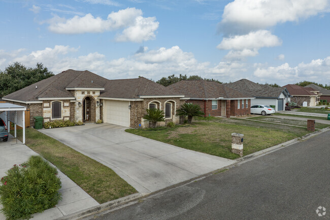 Various colored brick homes can be found in Alamo.