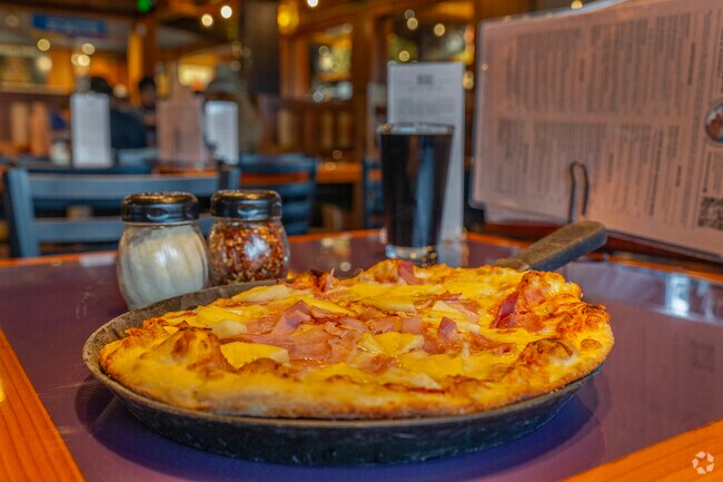 Brick oven-fired pizzas warm residents at Moose Tooth Pizza and Pub in Huffman-O'Malley.