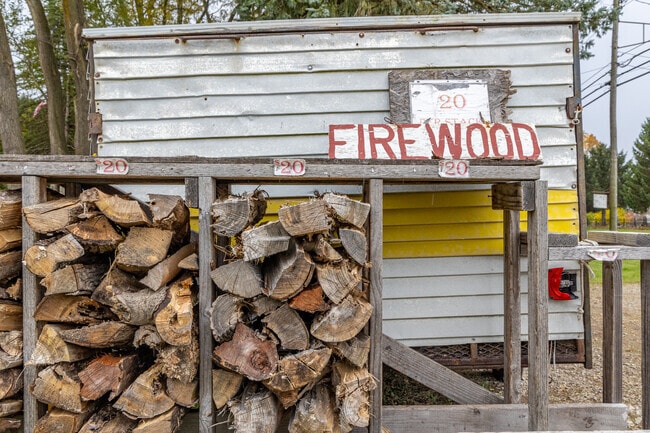 A local farm sells stacks of wood in Ray Township.