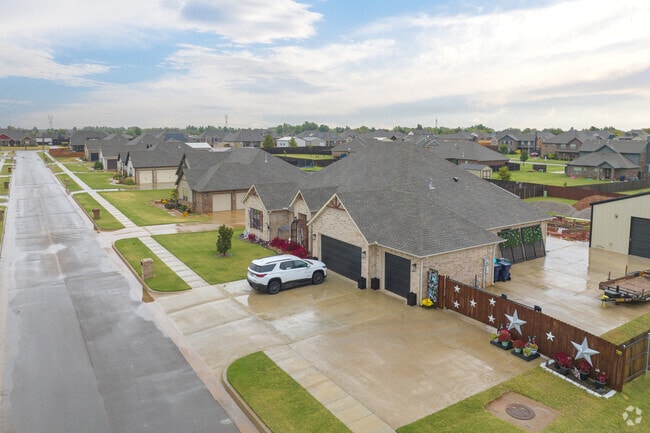 Spacious driveways in Chisholm Run-Siena can fit sheds or extra vehicles.