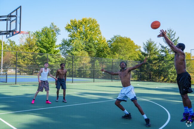 Residents can play competitive but friendly games on the basketball court at Armstrong Park.