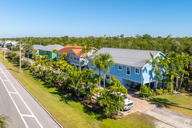 Stilted homes in Everglades City help protect against seasonal flooding.