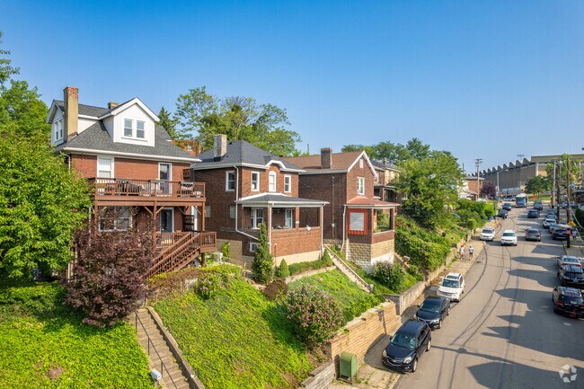 Many homes in West Oakland have large front staircases to get to their raised entrances.