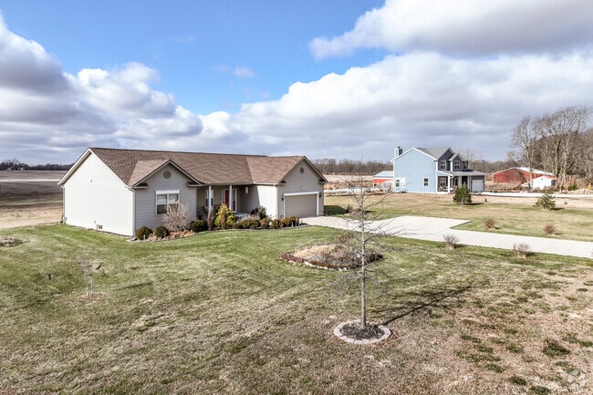 Set back from the road, Thompson’s homes stand individually on wide parcels, offering privacy and peace.